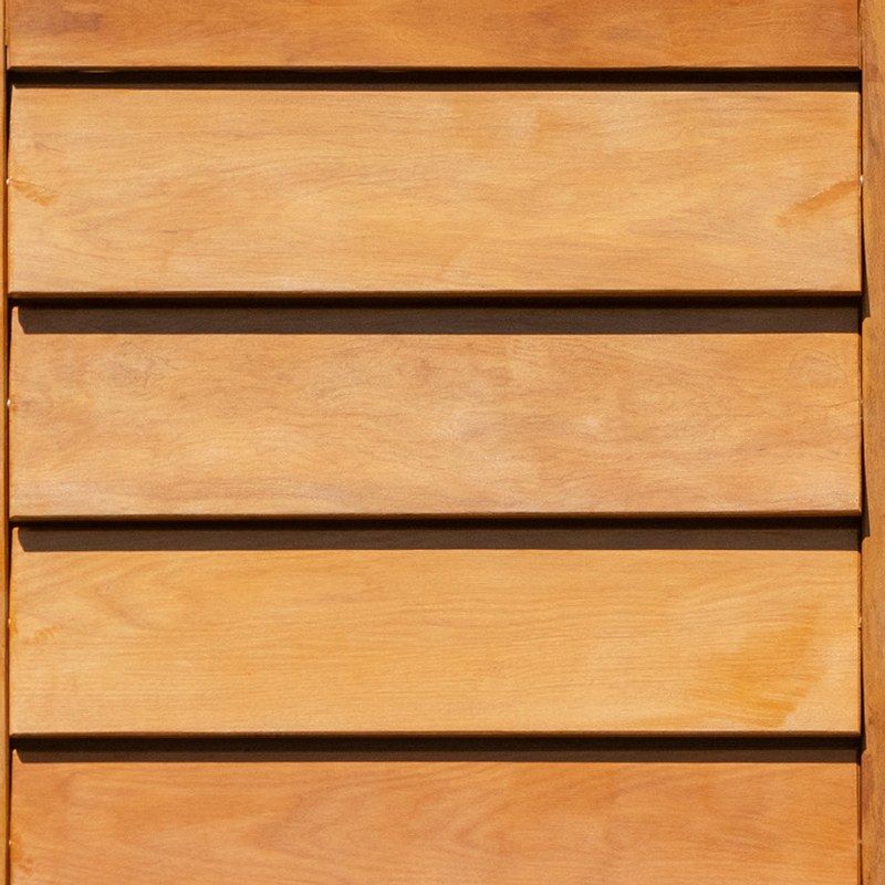 Horizontal louvres in orange-brown hardwood.
